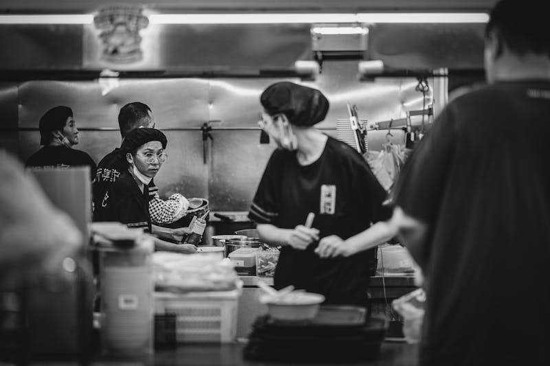 Friendly staff team at Green lantern pizza ready to serve customers